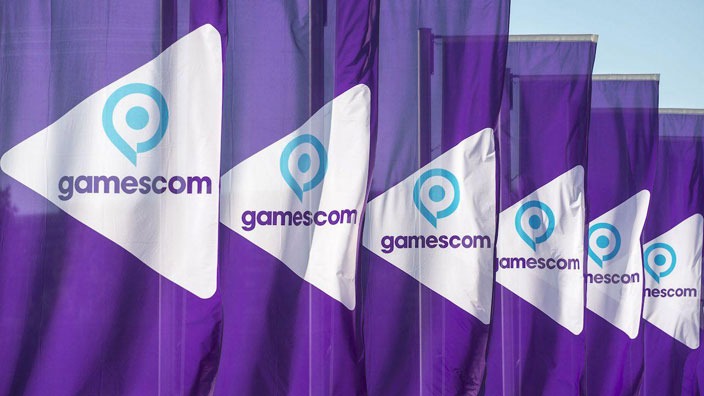 A row of purple flags sporting gamescom logos