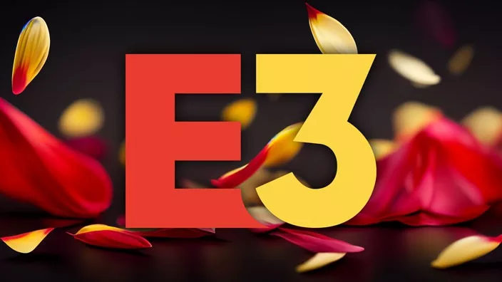 A sombre, funeral-inspired image. E3's iconic logo appears against a backdrop of gently drifting yellow and red petals.