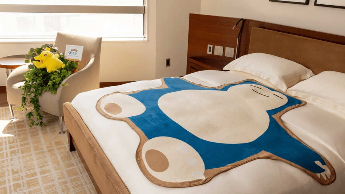 The budget-friendly "Pokémon Sleep Stay" room, featuring a fleecy Snorlax blanket instead of the giant plushie